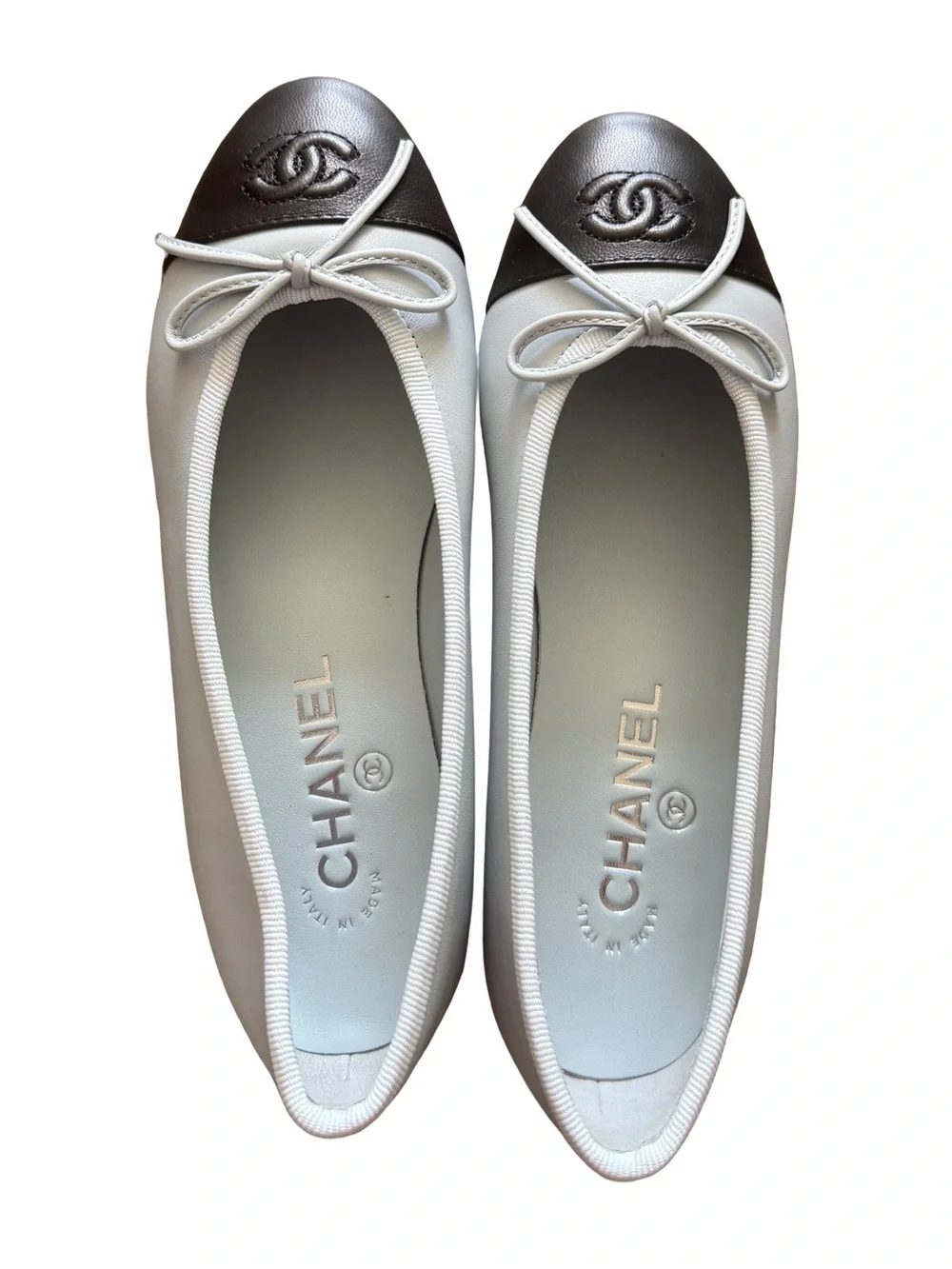 CHANEL Light Blue Leather Ballet Flats with Black Cap Toe and Bow